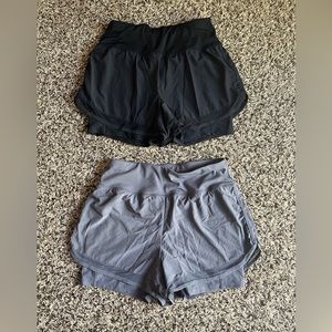 Two pairs of athletic shorts size medium